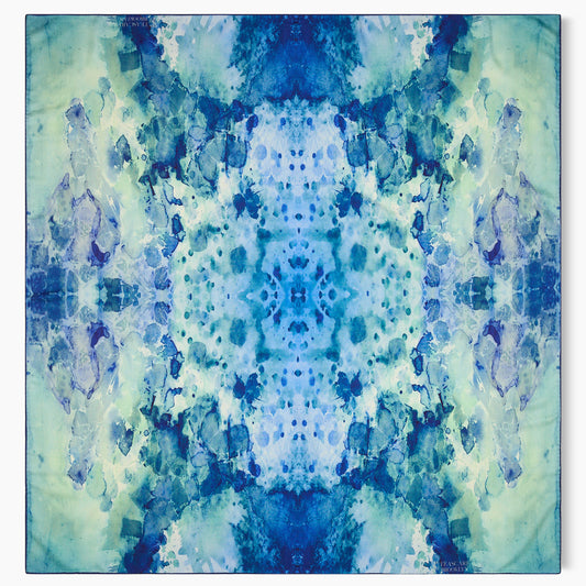 The Clear Blue Scarf from Teascarf Brooklyn, displayed flat to reveal its intricate details and vibrant artwork, highlighting its delicate texture and captivating design.
