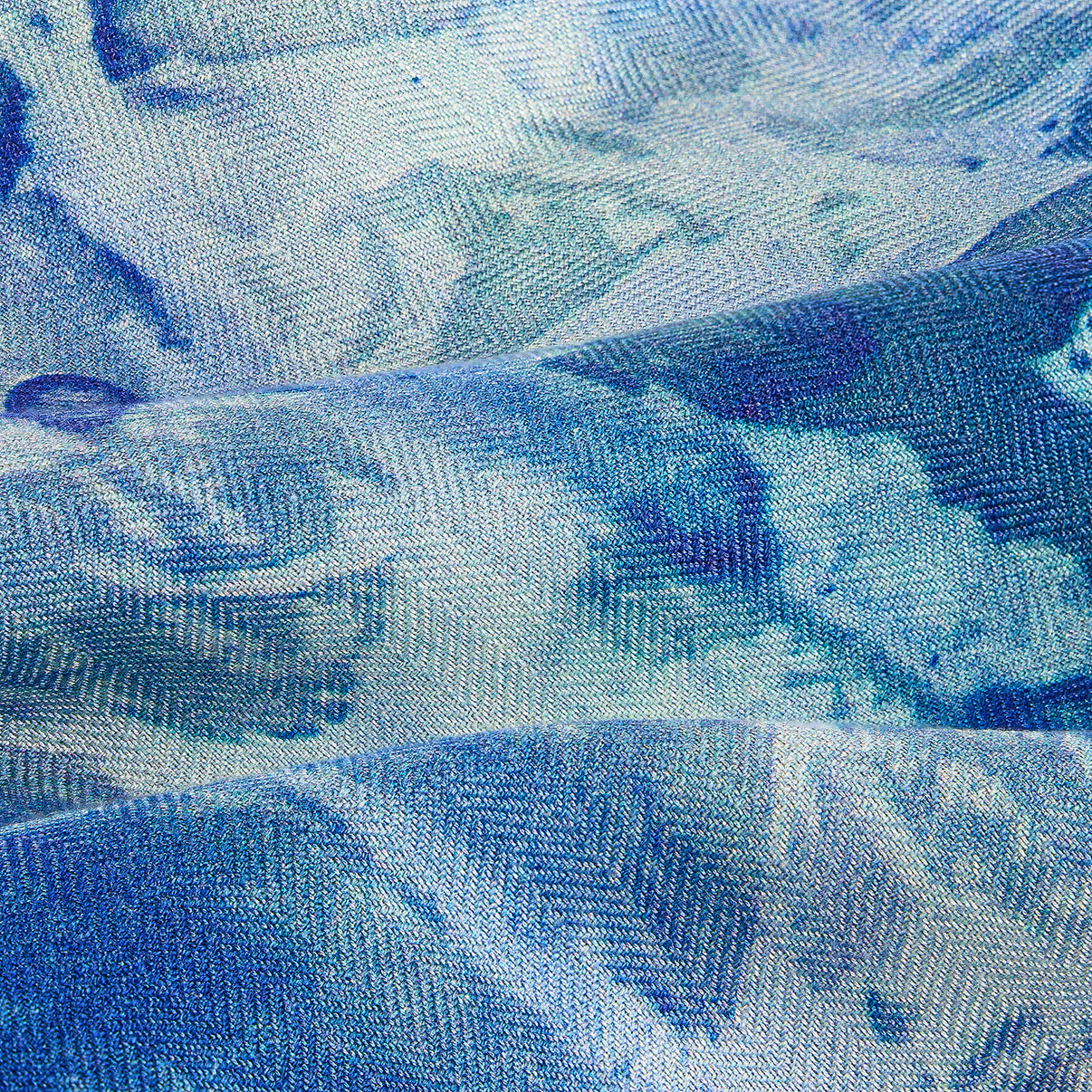 Close-up of Clear Blue Silk-Wool Scarf showing herringbone weave.
