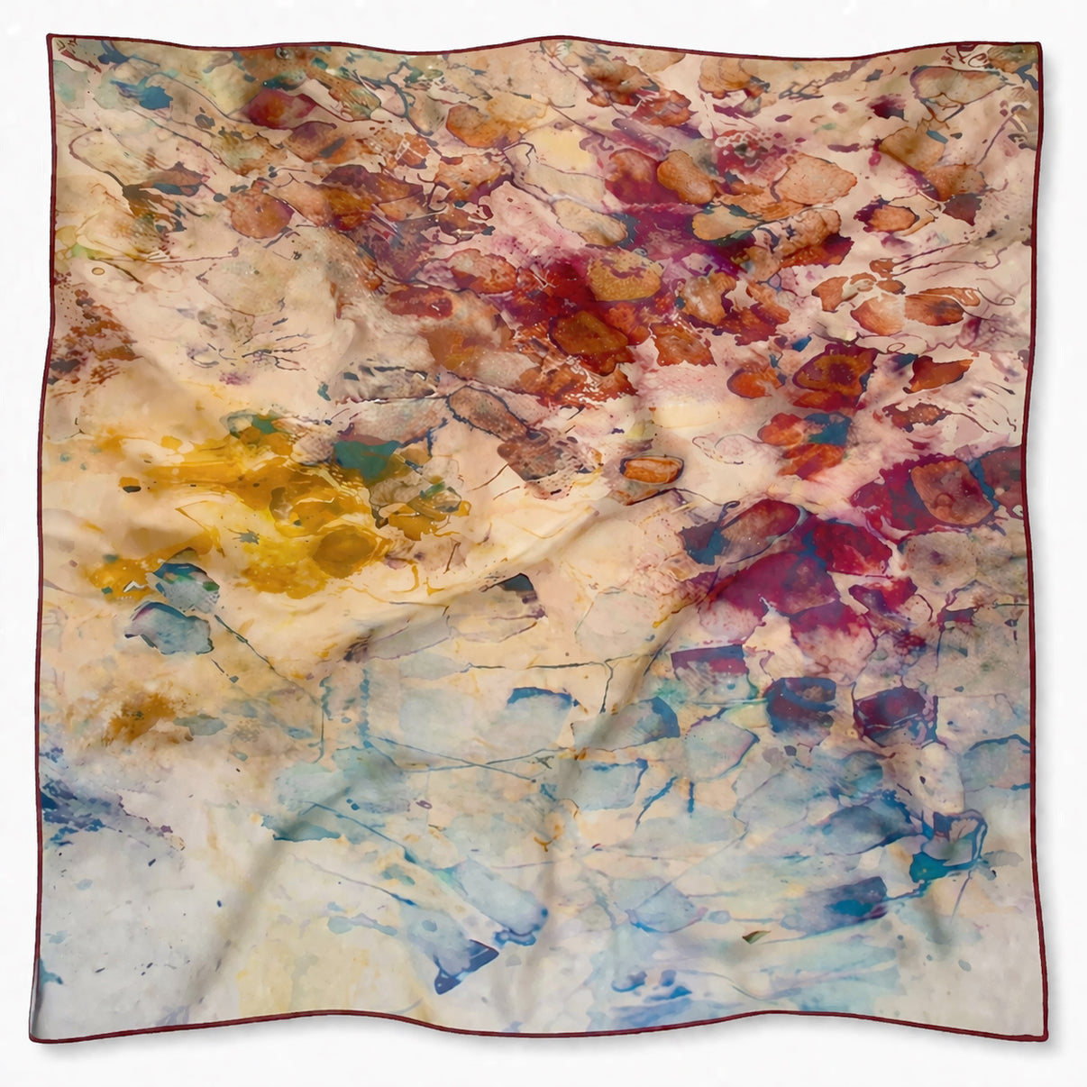 26x26", tea-printed, tan, gold, brown, and red art scarf with burgundy hand a rolled edge on a white background.
