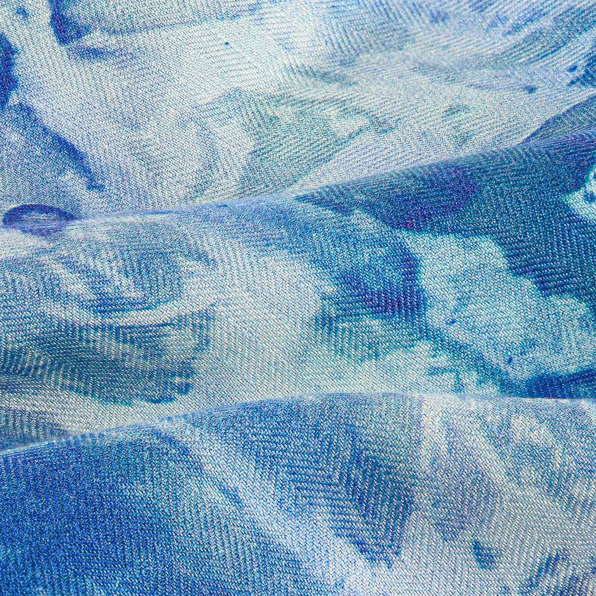 Close-up of Clear Blue Silk-Wool Scarf showing herringbone weave.
