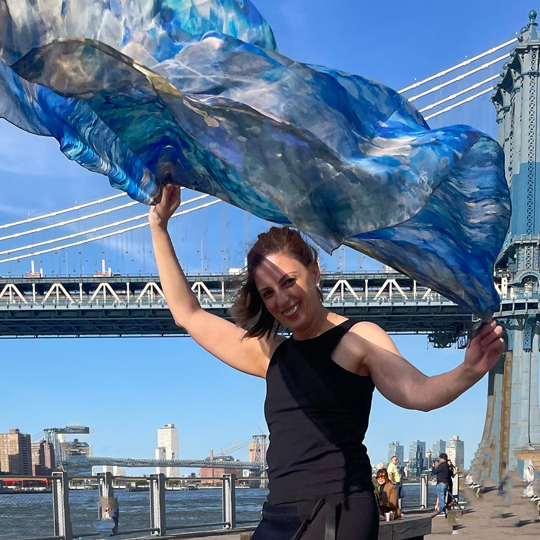 52x52" Oversized Blue Dream Scarf by Teascarf Brooklyn blows in the summer breeze South of the Manhattan Bridge.