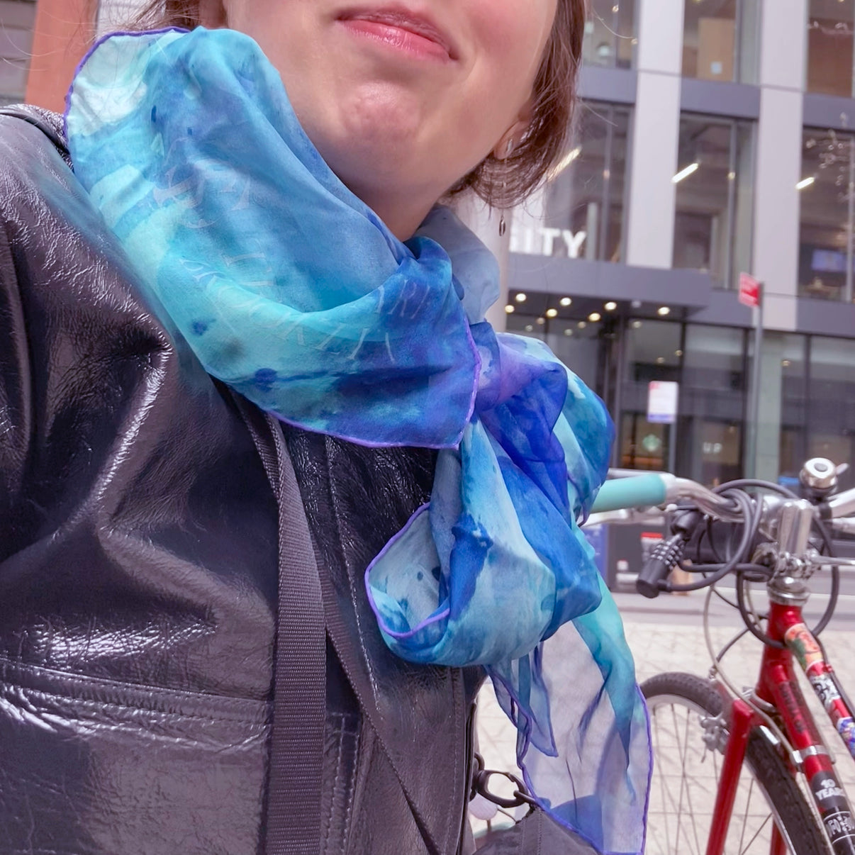 Model wearing Peacock Green Oversized Square Tea-Printed Silk Chiffon Art Scarf - 100% Silk, 52x52" - Teascarf Brooklyn