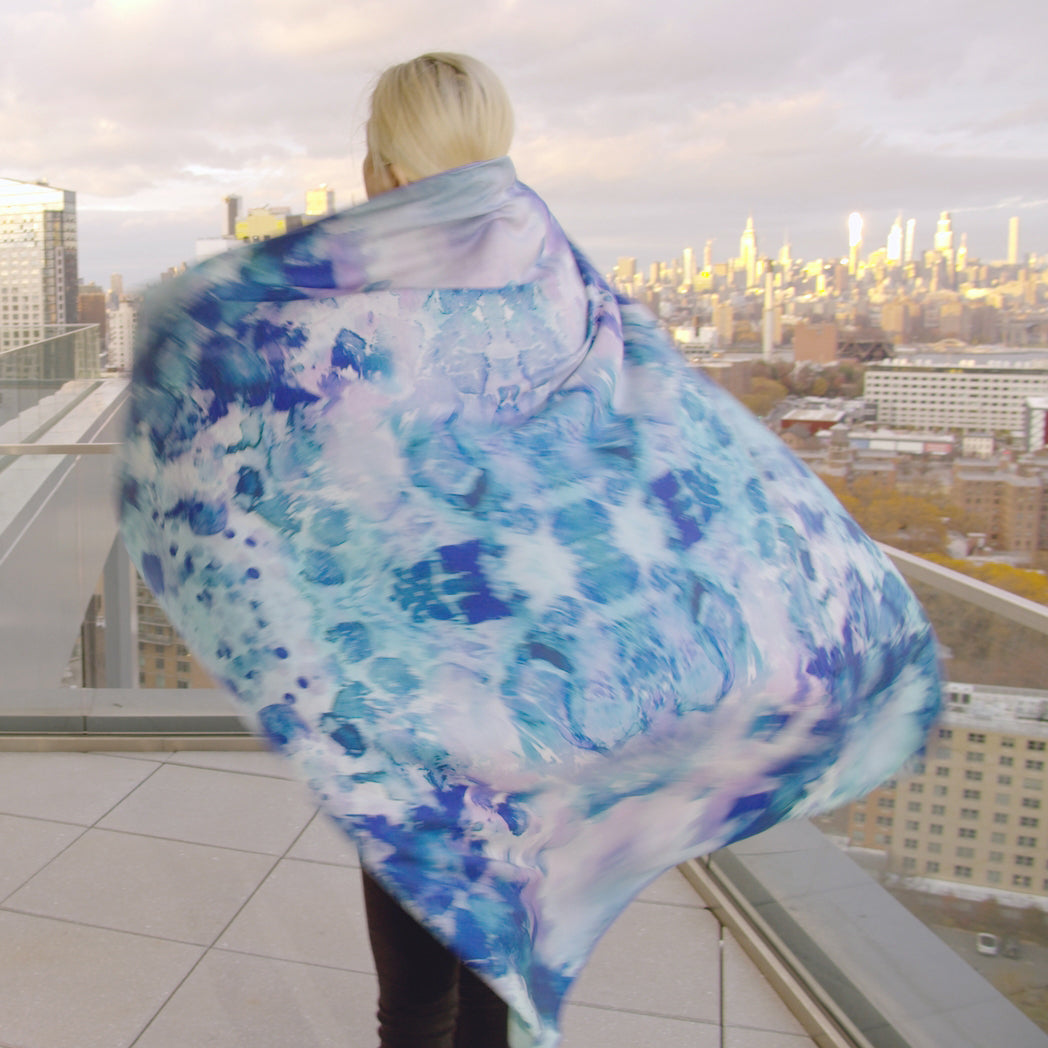 Back view of model wearing Peacock Green Silk-Wool Scarf 52" on a Brooklyn rooftop.