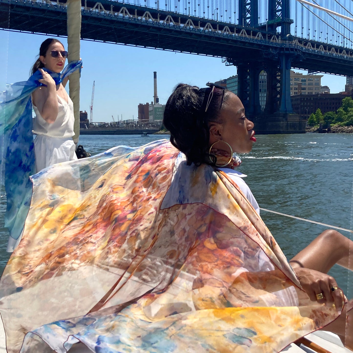 Rare Earth Clear Blue Boat pillow cover featuring a unique, handcrafted, tea print design with serene blue tones and rich browns, created by Teascarf Brooklyn.