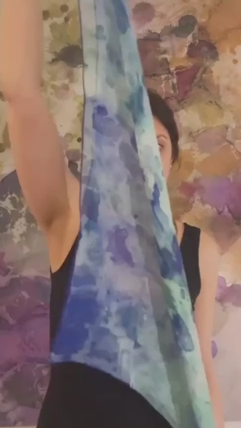 Video of model tying small 24x24" scarf around neck.