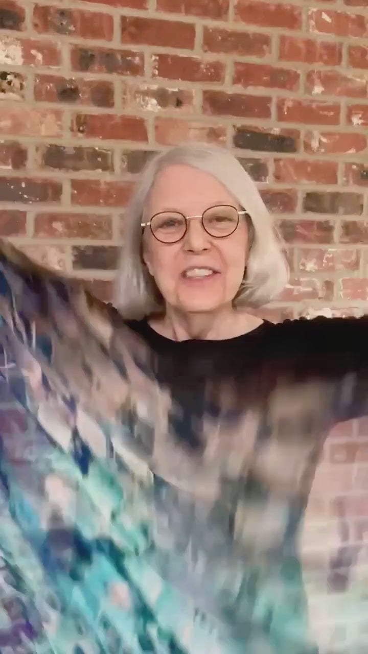 Woman reviews her purchase of Oversized Blue Dream scarf and pillow cover from Teascarf Brooklyn