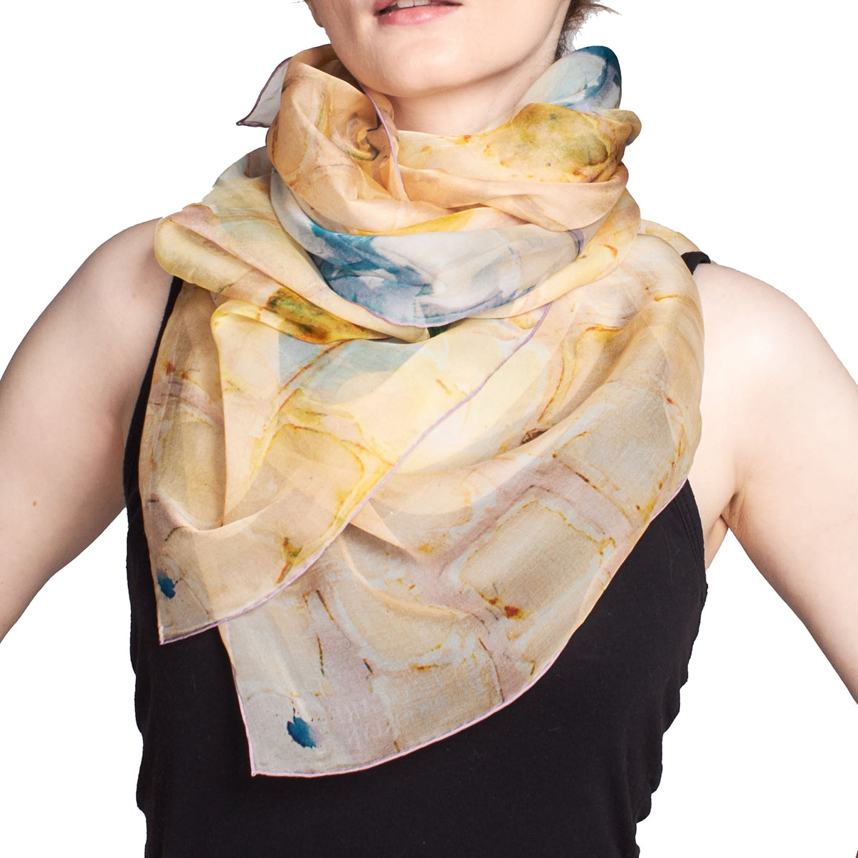 Model wears a sheer silk chiffon Camomile Scarf by Teascarf Brooklyn.